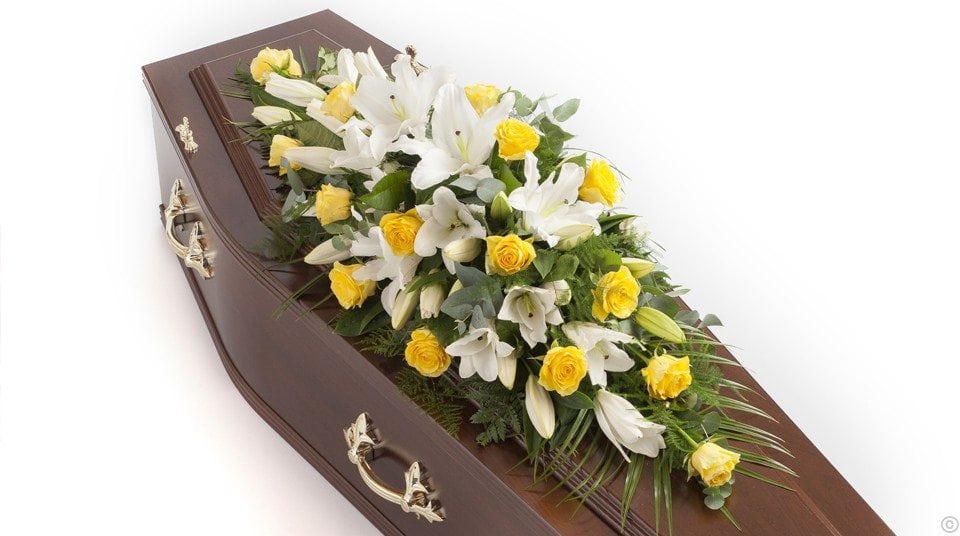 Rose and oriental lily casket spray